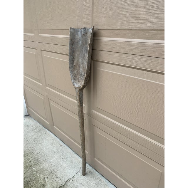 A beautiful antique rustic, farmhouse, or country wooden hand made grain shovel. This would be ideal for an installation...