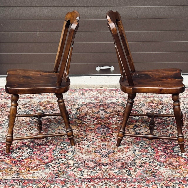 Pair of vintage Ethan Allen Old Tavern Antiqued Pine Country Dining Side Chairs. Model 12-6031