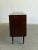 W71 D17 H32 The “Danish Modern Credenza” is crafted in teak wood and has been fully refinished in a deep, rich stain. This...