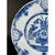 A fine 18th c Dutch Polychrome painted delft charger, decorated with vibrantly colored stylized tulips and flowers. The...