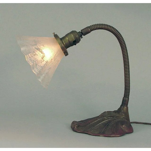 Table lamp ... or gymnast? Bends, flexes, moves in all directions! The shade predates the lamp base (probably), although...