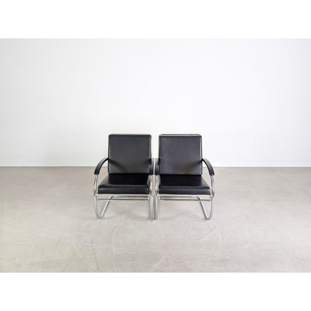 We are offering two beautiful vintage Thonet cantilever chairs for sale. Designed by Anton Lorenz in 1932, these chairs...