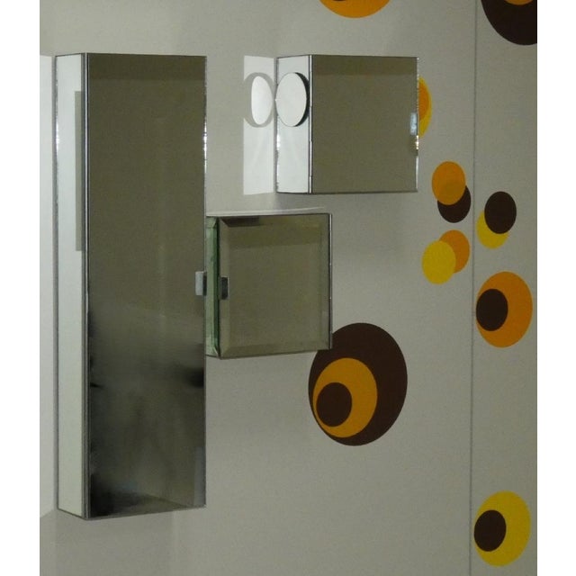 Set of three pieces: two square cabinets and one rectangular cabinet. Inside, there are glass shelves. Three truly unique...