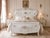 A charming 1950s Italian Venetian-style bedframe, beautifully crafted from solid beech wood and finished in a soft creamy...