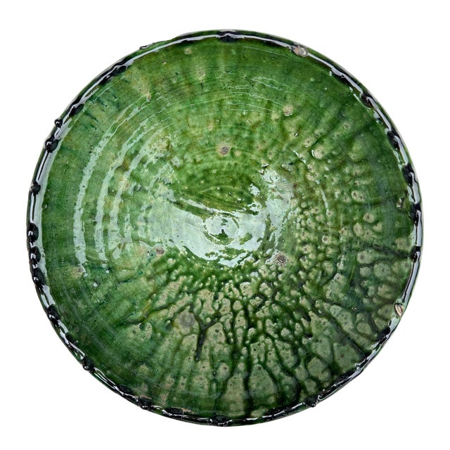 Handcrafted in southern Morocco, Tamegroute pottery is celebrated for its distinctive green glaze, organic forms, and...