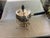 This classic mid century designed fondue pot includes a burner stand and the original burner. it has wooden handles and is...