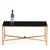 The table features an inset black mirrored top supported within a gilt brass frame . The design is restrained yet elegant,...