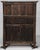possibly French, 17th/18th century, elaborately carved façade with gothic cathedral doors set with steel hinges, carved...