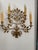 Stunning French Antique Sconces This elegant pair of gilt sconces with beautiful detailing and a wonderfully aged patina...