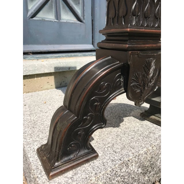 A very rare find and magnificent large-scale find this pair of period Arts & Crafts solid bronze andirons maintain their...