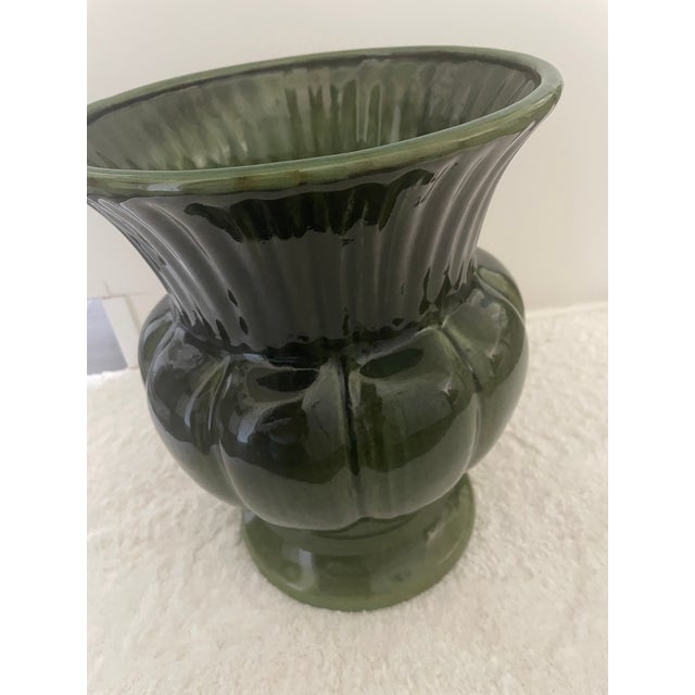 Lovely over sized vase in a dark green Majolica style,Made from glazed terra cotta purchased at John Roselli's Showroom in...