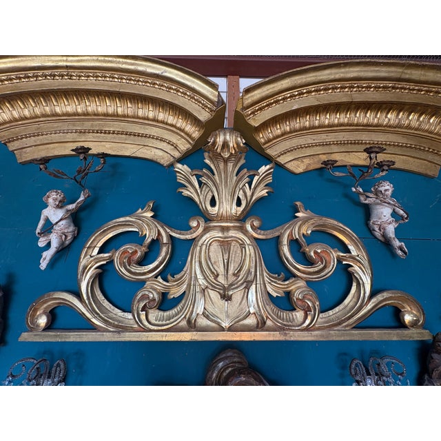 18th Century Italian Baroque Giltwood Overdoor Architectural Pediment. Offered is a large Italian Baroque gilt wood...
