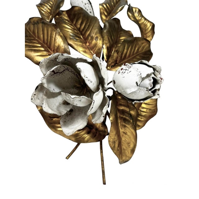 Add a touch of Italian style to your interior with this elaborate 1950s metal wall sculpture displaying a beautiful...