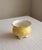 A cheerful and elegant little piece from one of England’s finest china houses, this Aynsley bone china cachepot is...
