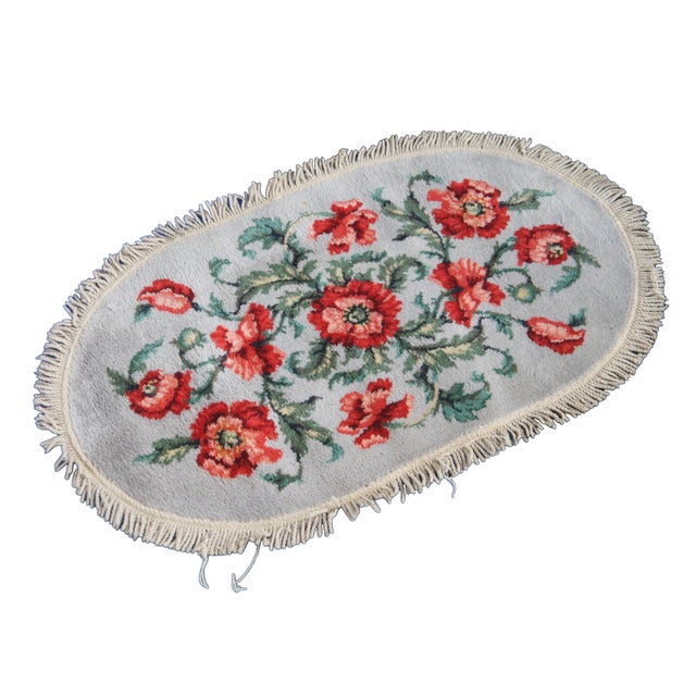 Vintage Karastan Decorette Poppy Moderne area rug / carpet / mat featuring oval form with floral design and fringe....