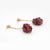 Stylish pink tourmaline cluster earrings crafted in 14k yellow gold (circa 1980s). Pink tourmalines measure approx. 3.5mm...