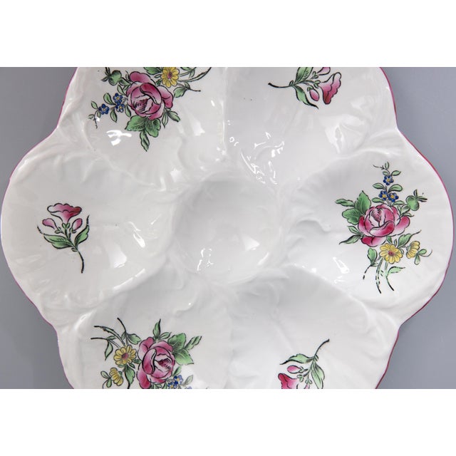A gorgeous antique French Majolica floral porcelain oyster plate by Keller & Guérin made in Luneville, France, circa 1890....