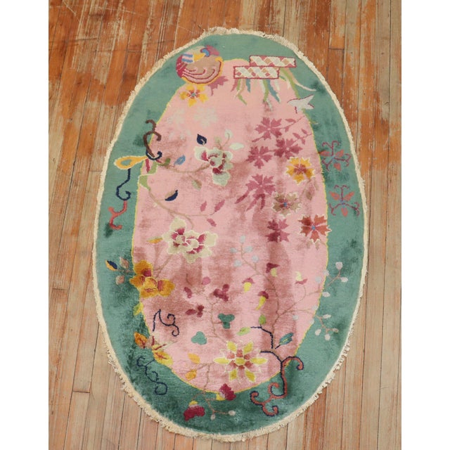 Rare oval-shaped Green Chinese Art Deco rug. Measures: 3' x 4'11'' Chinese Art Deco rugs are known for their striking mix...