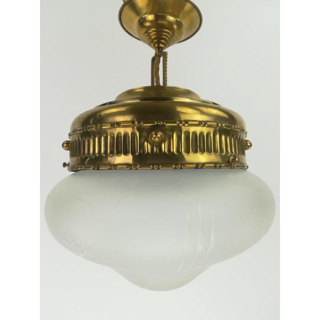 The lamp gives a cozy non-dazzling light. Surface polished. Re-electrified according to today's security standard....