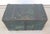 Antique green Seaman’s chest with metal straps. The top of the chest has the name “S. Hartridge” hand painted on it. The...
