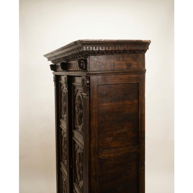 An impressive late 19th to early 20th century French Renaissance Revival armoire crafted from richly grained walnut and...