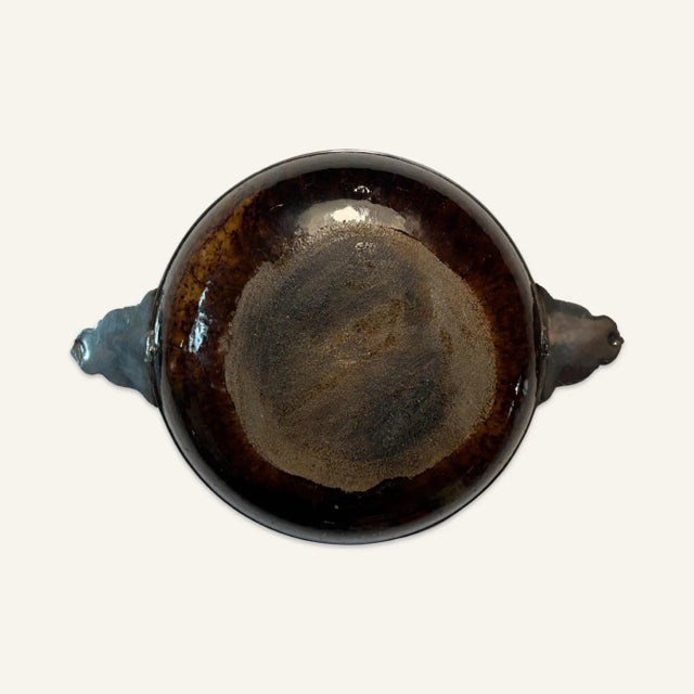 This double-handled shallow bowl by 19th and early 20th century French luxury goods designer Boin-Taburet consists of a...