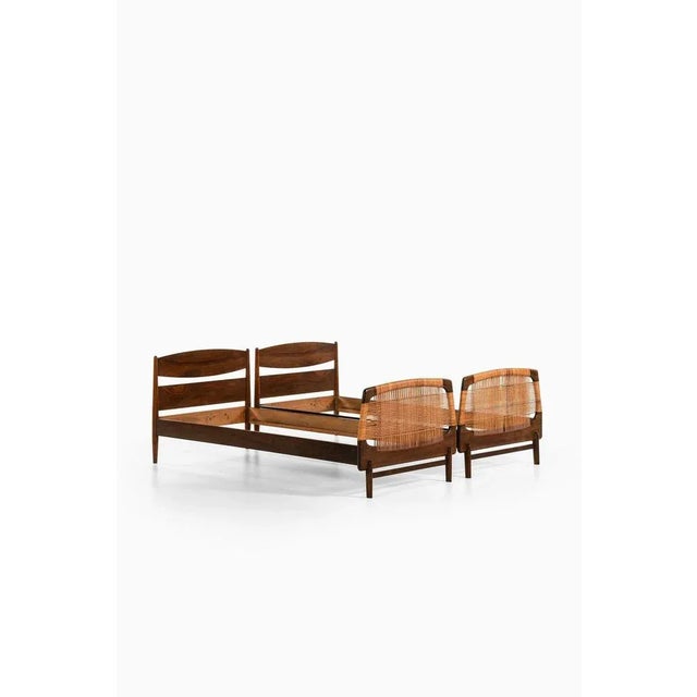 Rare bed frames in walnut and cane, 1950's additional information: material: walnut and cane style: mid century,...