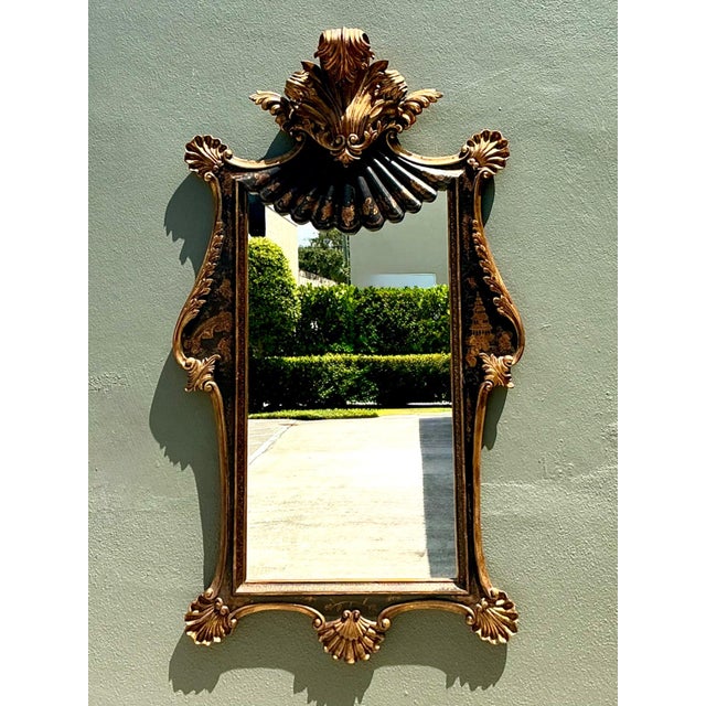 A magnificent vintage wall mirror by William Switzer, this statement piece embodies the timeless elegance of Chinoiserie...