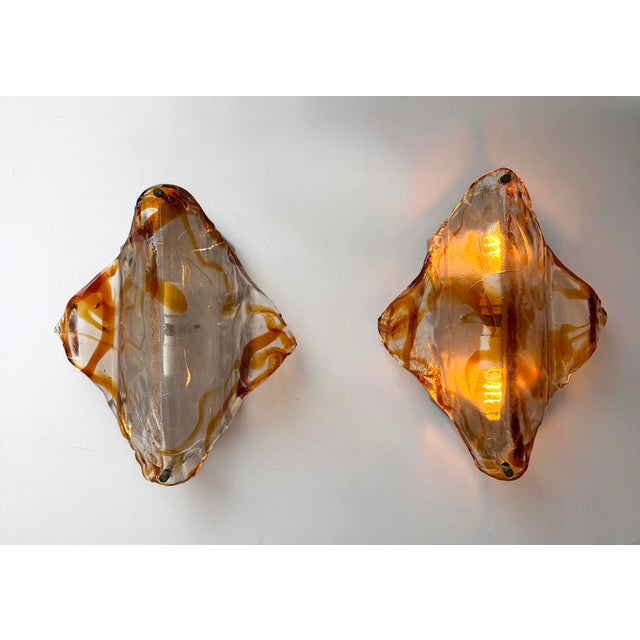 Mid-Century Modern Space Age pair of wall lights lighting lamps sconces amber textured murano glass and metal by the...