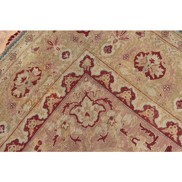 Antique 19th Century Indian Agra Rug in Solid Blue Background. This stunning antique Agra carpet beautifully illustrates...