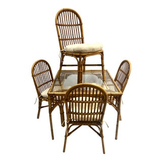 Mid-Century Rattan Table and Four Chairs With Cushions For Sale