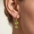 Bring a vibrant splash of nature’s finest color to your jewelry collection with these exquisite double-drop huggie...