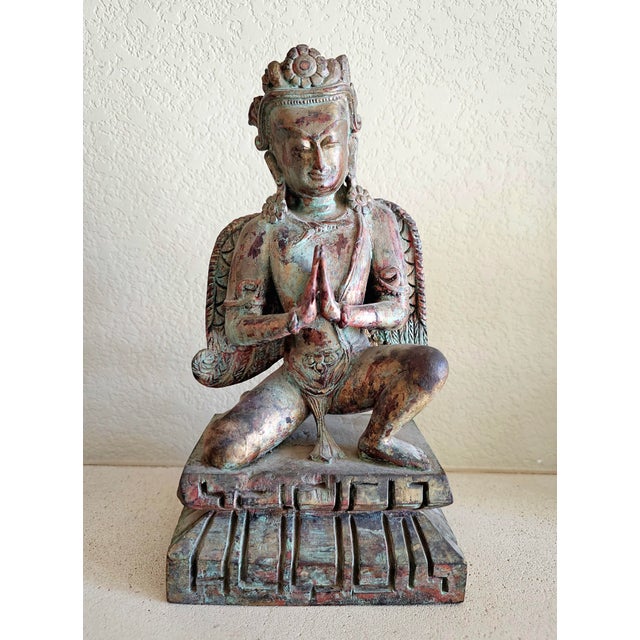 Late 19th–Early 20th Century Southeast Asian Hand-Carved Wooden Kinnari Figure A finely hand-carved wooden sculpture...