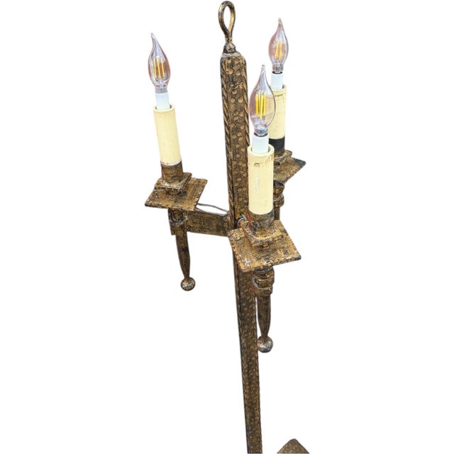 Beautiful antique Spanish floor lamp with hand-forged iron construction and a richly aged gilt / gold-toned patina. This...