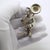 A playful yet highly collectible piece, this vintage Italian sculpture by Angini captures a whimsical street artist...