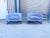 Infuse mid-century glamour into your interior with this striking pair of low-slung barrel lounge chairs, styled in the...