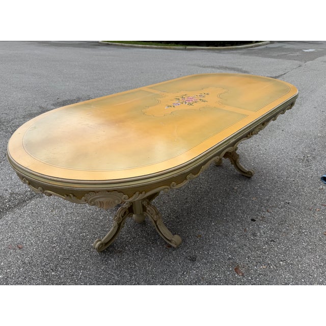Make a dramatic and luxurious statement in your dining space with this Late 20th Century Italian Baroque Revival dining...