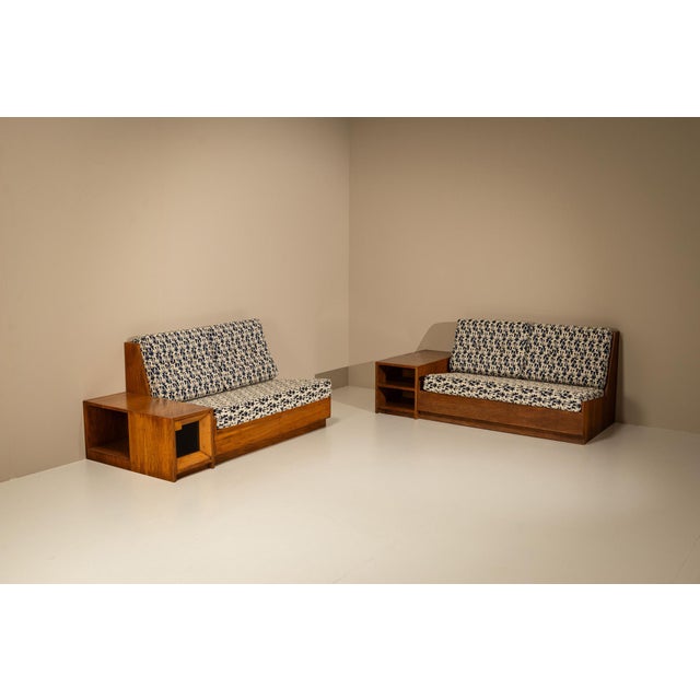 There is a calm authority to this set by Rivadossi. Two low benches and two integrated storage elements come together in a...