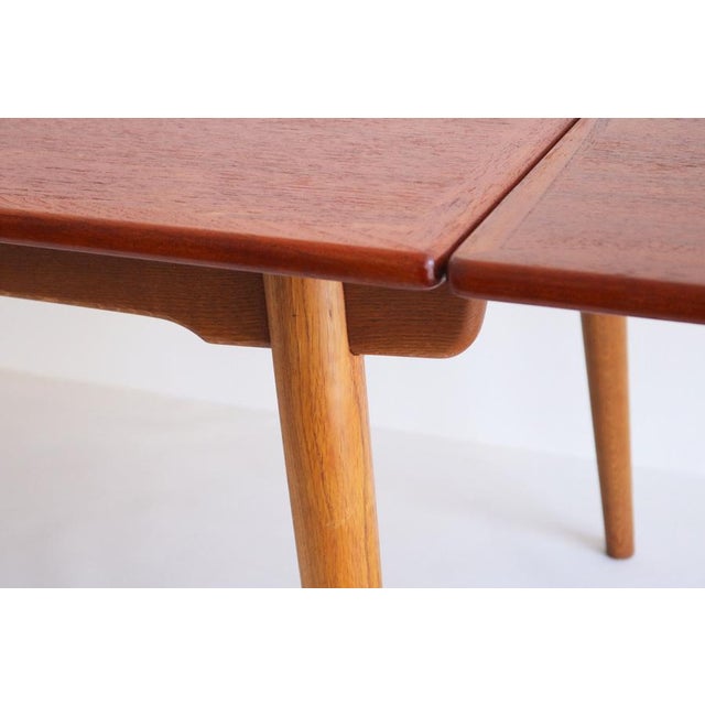 Large Extendable AT-312 Dining Table in Teak and Oak by Hans J. Wegner for Andreas Tuck, 1950 For Sale - Image 10 of 14
