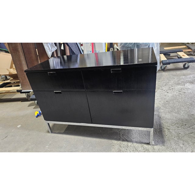 A timeless piece from modernist icon Florence Knoll, this 2-position credenza combines elegant form with practical...