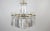 An exceptional two-tiered chandelier made of dozens of hand-cut and polished lead crystal pendants. The long prismatic...