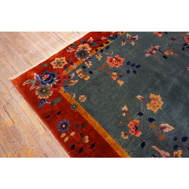 Tranquil and Calming Light Blue Background With Warm Red Field and Magnificent Array of Multicolored Floral Motifs Antique Chinese Art Deco Rug For Sale - Image 14 of 15
