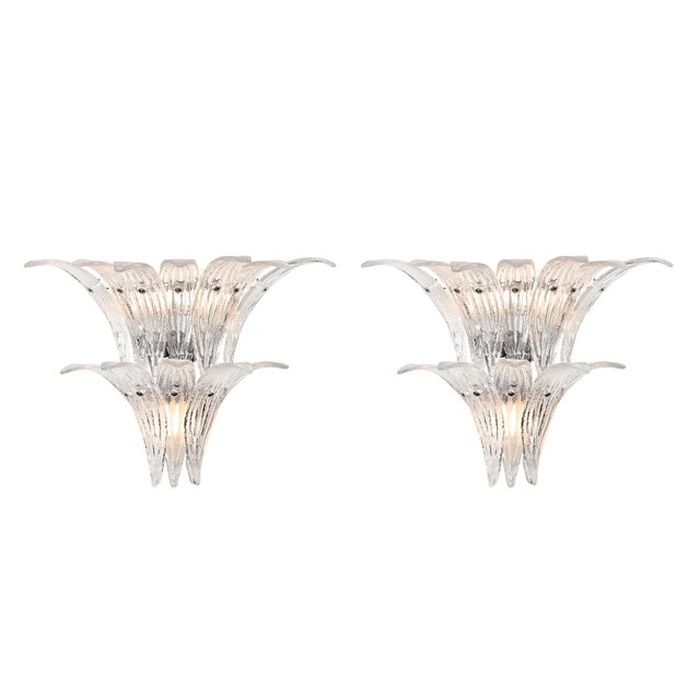 These exquisite sconces are a superb example of contemporary Murano glass artistry, blending innovative design with...