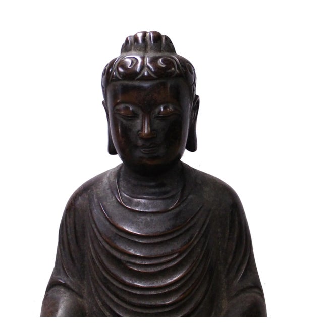 This is a nicely made bronze metal Buddha Statue with charm bronze brown metal color and precise body details. It is a...
