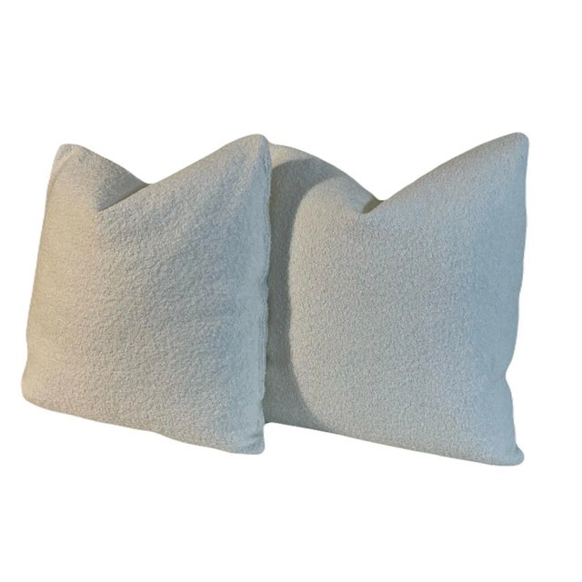 This pair of pillows feature Manuel Canovas “Gloria Neige” Boucle on both sides. Tapered corners to prevent dog ears,...