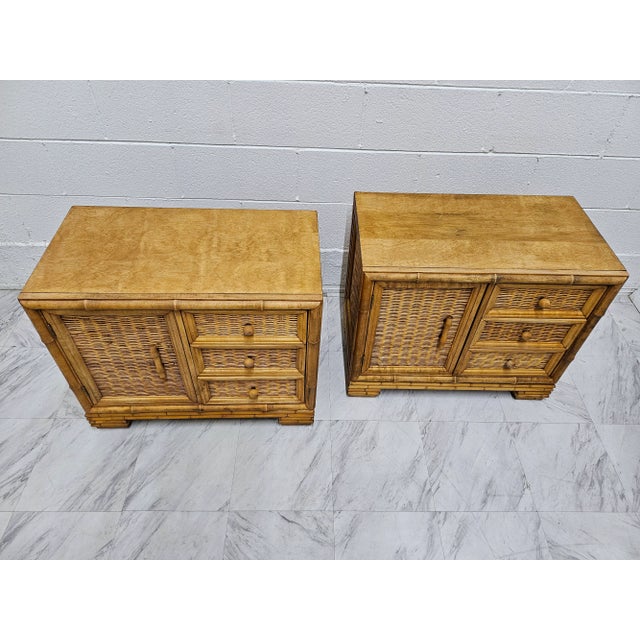 Pair of night stands made out of wood and woven rattan Made by American of Martinsville Co Circa 1970's Overall in good...