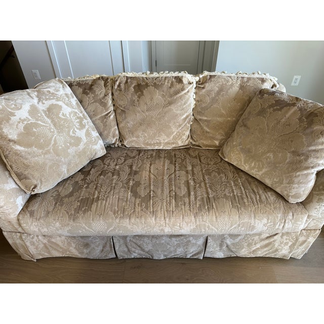 Elevate your living space with this classic camel‑back sofa from Vanguard, a brand known for exceptional craftsmanship and...