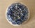 A charming American studio pottery berry colander, hand-thrown in speckled stoneware and decorated in cobalt blue, cream,...