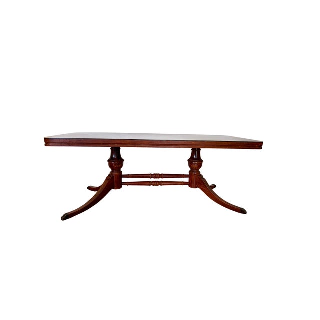 Compact, lightweight Vintage Mersman cocktail table. Top is in almost perfect condition. Surface scuffs along legs....