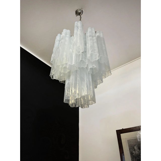 ELECTRICAL SYSTEM ADAPTED FOR US/AU/EU Italian glass chandelier with albaster white glass tubes. The armor polished nickel...